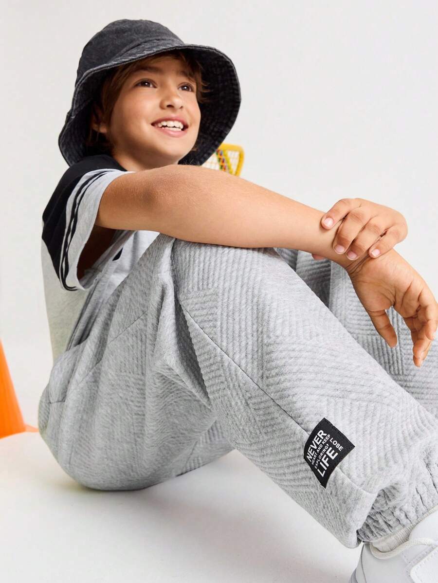 SHEIN Pantaloni sport casual, simpli, confortabili, cu talie medie, cu tiv elastic, pentru băieți Tween - Gri - Vizualizare 1