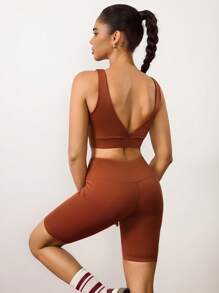 Hanevo Damen Set aus einfarbigem Crop Top-Sport-BH und hochtailliger Radlerhose, geeignet für Fitness und Sport