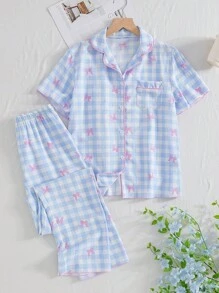 少女睡衣套装，时尚优雅的浅蓝色格子印花，搭配粉色蝴蝶结、荷叶边短袖上衣和长裤家居服两件套浅蓝色睡衣套装格子睡衣套装返校时尚