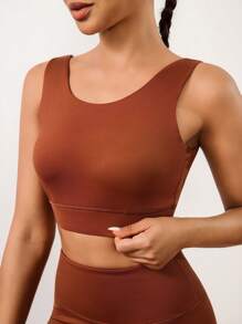 Hanevo Damen Set aus einfarbigem Crop Top-Sport-BH und hochtailliger Radlerhose, geeignet für Fitness und Sport