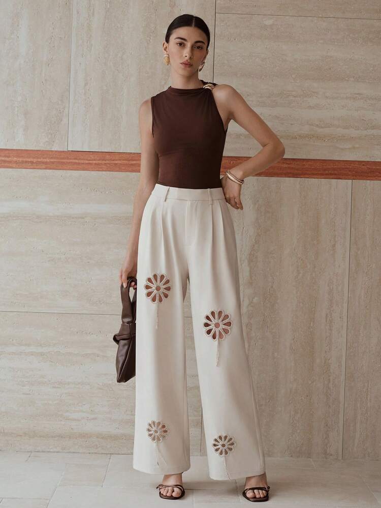 Pantalones de pierna ancha con pliegues de corte por láser con strass