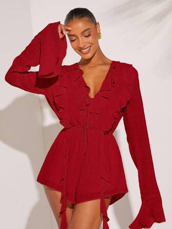 L'Amorae Elegant enfärgad jumpsuit med volanger och utsvängda ärmar