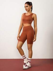 Hanevo Damen Set aus einfarbigem Crop Top-Sport-BH und hochtailliger Radlerhose, geeignet für Fitness und Sport