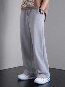 SHEIN Quần nỉ dáng ôm thoải mái, màu trơn giản dị cho bé trai tuổi teen, thích hợp mặc khi đi làm, đi học, giải trí hàng ngày, du lịch, thể thao, tiệc tùng, mùa thu/đông - Màu Xám nhạt - Xem 1