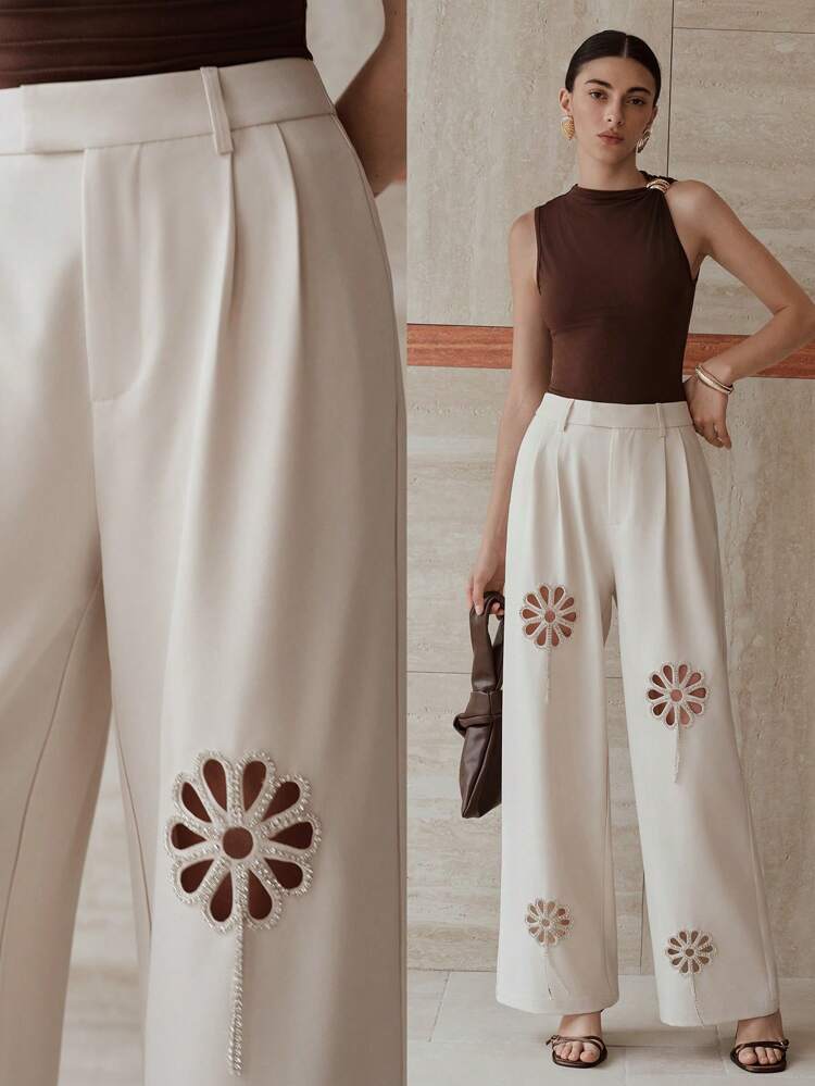 Pantalones de pierna ancha con pliegues de corte por láser con strass