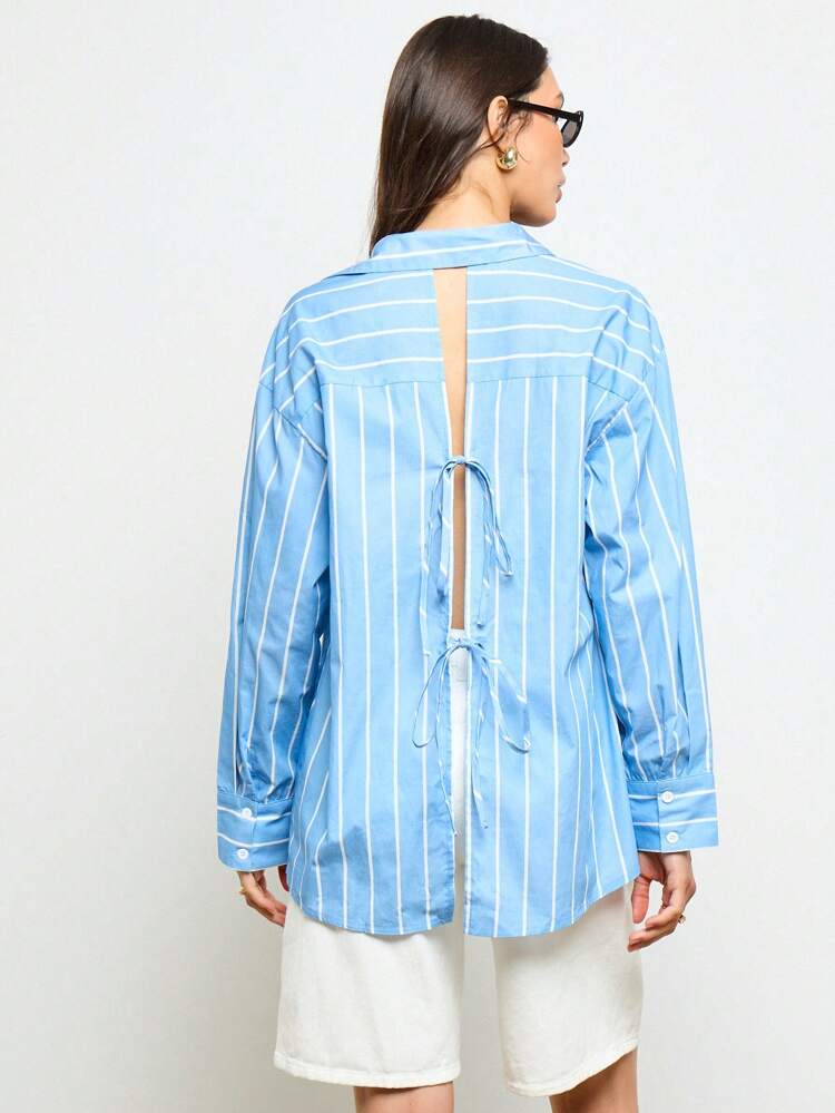 Chemisier oversize à col boutonné et manches longues à dos ouvert