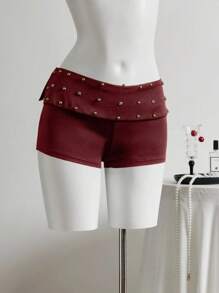 Elamini Minifalda short asimétrica de cintura baja con diseño de remaches - Óxido marrón - Ver 1