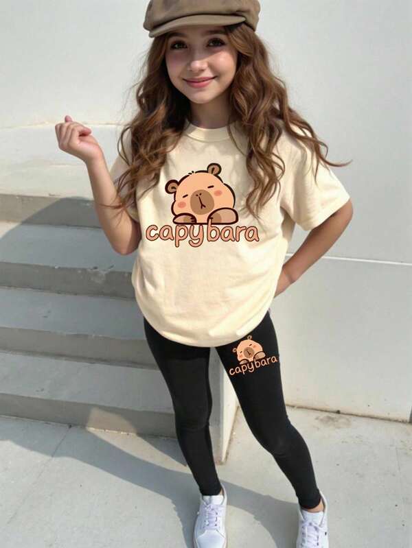 Conjunto de 2 piezas de camiseta de manga corta con diseño y eslogan impreso de capibara lindo y leggings casuales y de moda para niña joven