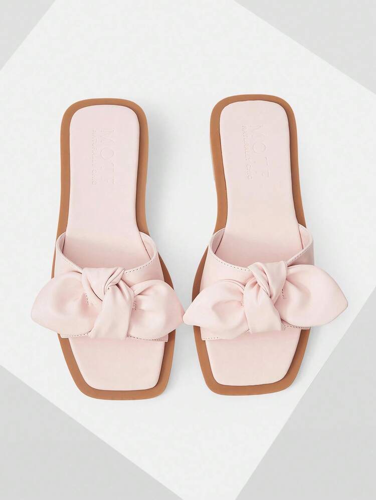 SANDALIAS PLANAS CASUALES Y CÓMODAS COLOR ROSA PARA MUJER CON DECORACIÓN DE LAZO
