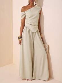 Zivah 2 件/套 2025 春夏新品系列音乐节、复活节、圣帕特里克节、西部风格、游牧风格、生日派对、毕业季、学院风、学生装、日常休闲、基本百搭、休闲、度假、邮轮旅行、海滩、日光浴、病毒式、街头服饰、婚礼嘉宾波西米亚风格、通勤风格、早午餐装、机场装 - 米色不对称肩部设计褶皱下摆短款上衣和阔腿裤纹理面料两件套 - 杏色 - 查看 5