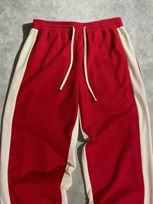 Manfinity EMRG بنطلون رجالي رياضي كاجوال فضفاض بربطة خصر و ساقين واسعتين بخصر قابل للسحب وخطوط جانبية متباينة