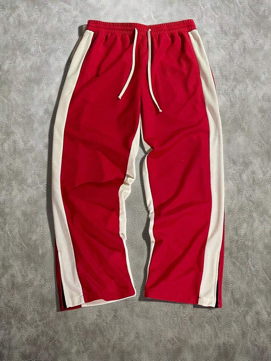 Manfinity EMRG بنطلون رجالي رياضي كاجوال فضفاض بربطة خصر و ساقين واسعتين بخصر قابل للسحب وخطوط جانبية متباينة