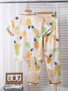 Conjunto de chaqueta tipo cárdigan y pantalón largo casual con estampado todo sobre piña, look minimalista y fresco para niñas preadolescentes