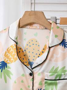 Conjunto de chaqueta tipo cárdigan y pantalón largo casual con estampado todo sobre piña, look minimalista y fresco para niñas preadolescentes