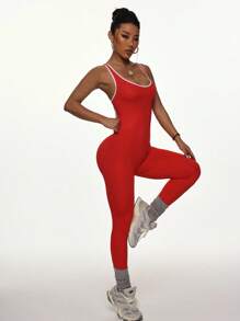 Slayoga Kontrastfarbener Bodysuit mit roten und weißen Kreuzträger-Rückendetails