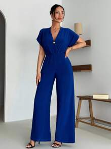 EURMUSE Tuta elegante con parte superiore a fascia, dettaglio maniche a campana, scollo a V, vita elastica, lunghezza intera, tessuto morbido e fluido, stile da abito da sera, dettaglio fiocco al collo, adatto per eventi professionali, materiale di qualità premium, moda contemporanea, vestibilità comoda, pronta per occasioni speciali, silhouette moderna, stile sofisticato, tessuto facile da curare, design versatile, perfetta per eventi - Blu reale - Visualizzare 4