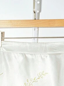 Falda acampanada de satén con estampado floral y cintura elástica para tallas grandes