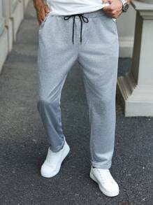 Manfinity Homme 男士休闲纯色抽绳腰斜口袋运动裤