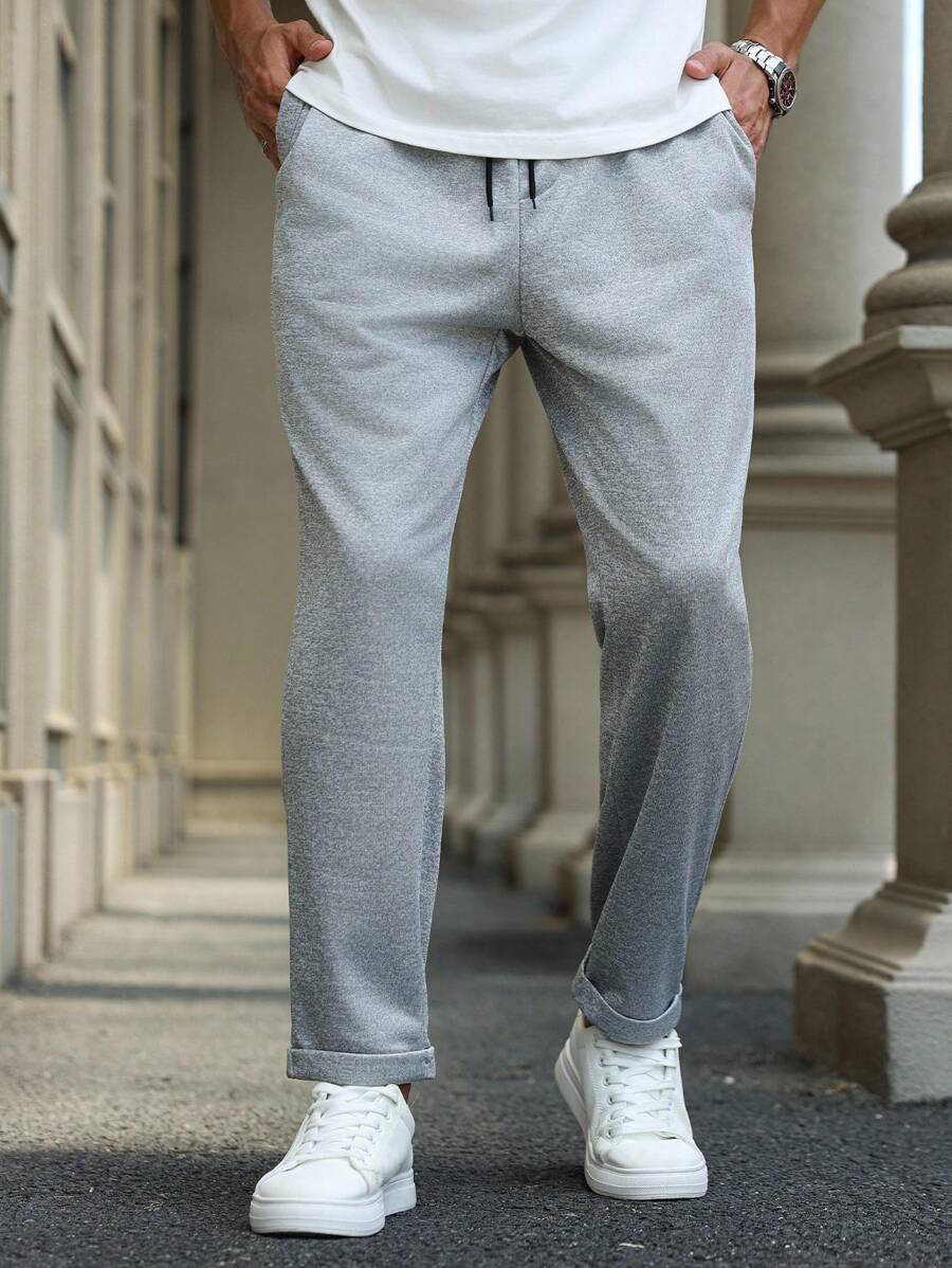 Manfinity Homme 男士休闲纯色抽绳腰斜口袋运动裤