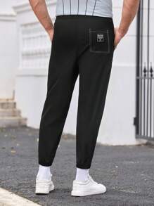 Manfinity VCAY Pantaloni casual in tessuto lavorato, vestibilità ampia, coulisse in vita, colore tinta unita, adatti a un utilizzo quotidiano, giovani e alla moda - nero - Visualizzare 2