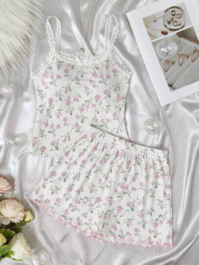 SHEIN Set de 2 piezas de pijama informal y cómodo con camiseta sin mangas con volantes de lazo con estampado floral y pantalones cortos para niña preadolescente