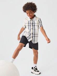 SHEIN Camisa Casual De Manga Curta Xadrez Tecido Plano Com Corte Solto Para Meninos Pré-adolescentes