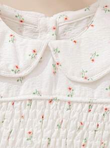 SHEIN 2025 Toddler Girl Ditsy Floral Sweet Puff Sleeve Smock Dress With Flared Hem Baby Girl Smocked Dress Smocked Dress Baby Smocked Baby Girl Dress Elegant Baby Flower Dress Smocked Dress Toddler, Baby Girl Floral Dress, Baby Girl Summer Dress, Baby Girl White Dress, Baby Tea Party Dress - White - View 5