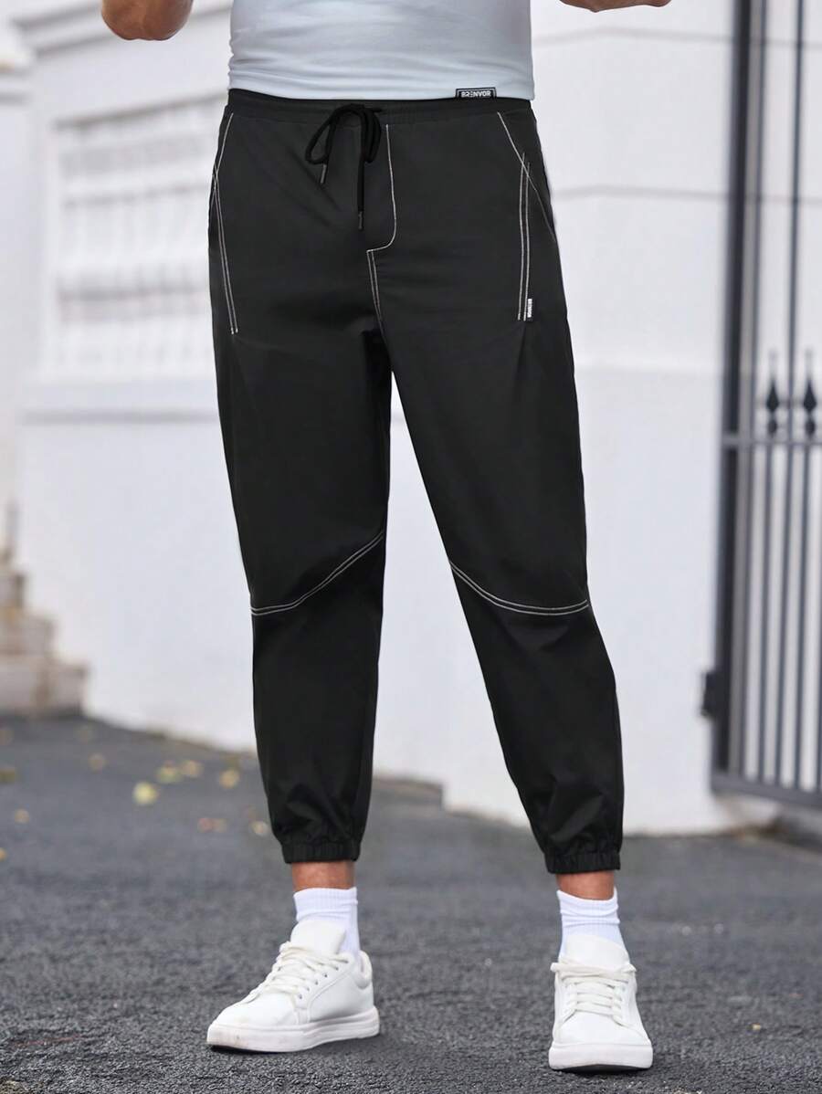 Manfinity VCAY Pantaloni casual in tessuto lavorato, vestibilità ampia, coulisse in vita, colore tinta unita, adatti a un utilizzo quotidiano, giovani e alla moda - nero - Visualizzare 1