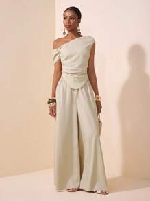 Zivah 2 件/套 2025 春夏新品系列音乐节、复活节、圣帕特里克节、西部风格、游牧风格、生日派对、毕业季、学院风、学生装、日常休闲、基本百搭、休闲、度假、邮轮旅行、海滩、日光浴、病毒式、街头服饰、婚礼嘉宾波西米亚风格、通勤风格、早午餐装、机场装 - 米色不对称肩部设计褶皱下摆短款上衣和阔腿裤纹理面料两件套 - 杏色 - 查看 4