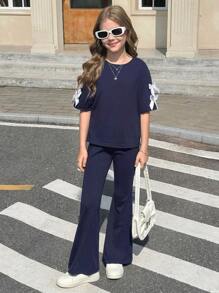 Set de 2 piezas de niña preadolescente: Camiseta de manga corta suelta con lazo decorativo y pantalones acampanados, versátil y casual, adecuado para el verano y el regreso a la escuela - Negro - Ver 7