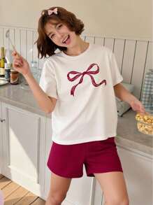 Set da due pezzi per ragazze pre-adolescenti, composto da top a maniche corte con stampa a fiocco in jacquard avorio e pantaloncini a righe in maglia, adatto per il ritorno a scuola - Multicolore - Visualizzare 11