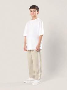 SUMWON 男童运动紧身尼龙运动裤，侧边条纹，休闲舒适，适合春秋季日常穿着，抽绳可调节，时尚有型，适合秋冬季节。 - 卡其色 - 查看 3