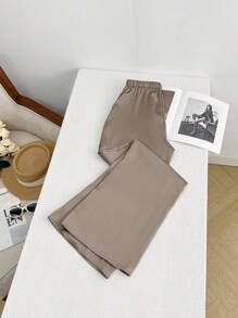 Pantalones sueltos informales de pierna ancha y cintura elástica de unicolor para mujer