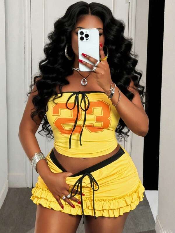 Slaydiva 2pcs 2025 Spring/Summer New Streetwear & Sexy Style, Yellow Contrast Black Trim, No.23 Graphic, Fitted Bustier With Decorative Drawstring And Multi-Layer Ruffle Hem Mini Skirt, Plus Size Ladies 2 Pieces Set