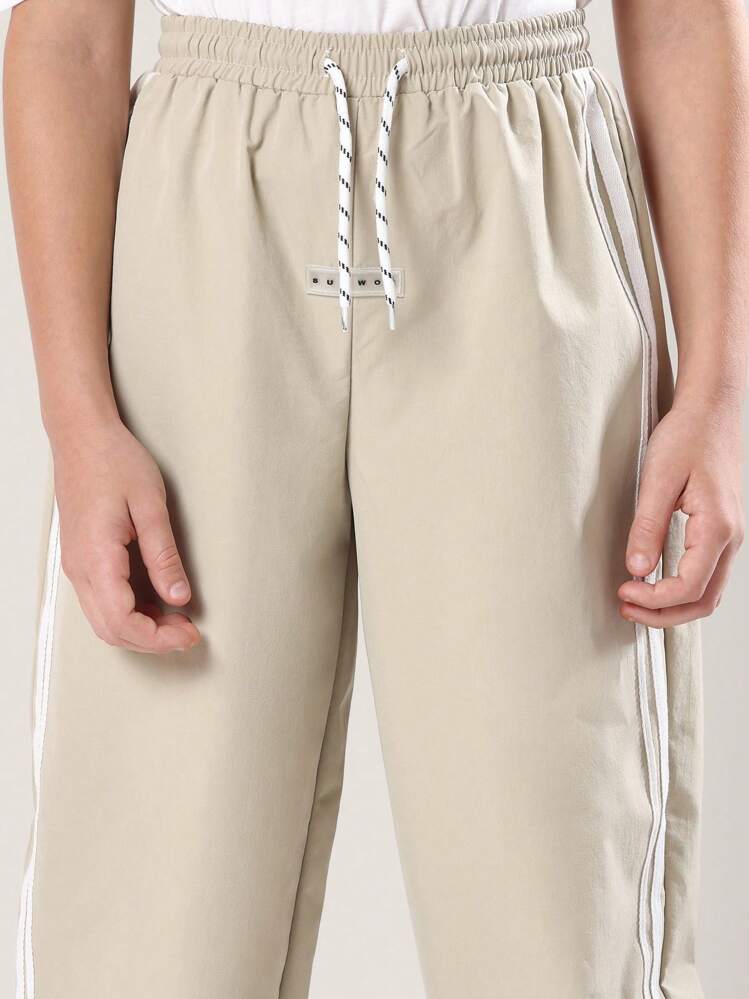 SUMWON Athletic Youth Barrel Fit Nylon Track Pants With Side Stripe Casual Fall Spring Comfortable Everyday Wear Drawstring Adjustable Chic Outfits For Autumn/Winter - Khaki - View 5