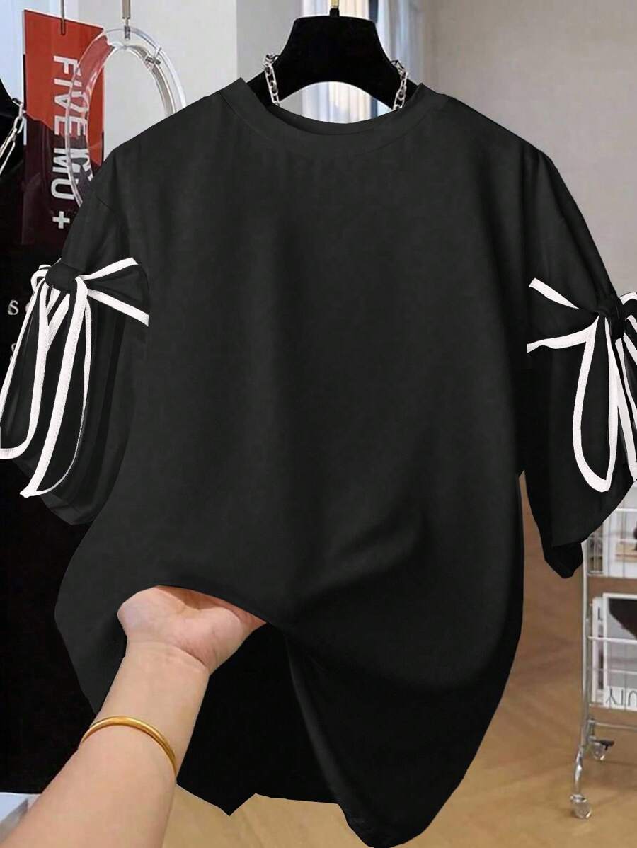 Calvaya Kaos Kasual Wanita Ukuran Besar Motif Garis Dua Warna dengan Hiasan Pita Besar, Cocok untuk Bepergian, Bersantai, dan Berolahraga - Hitam - View 1