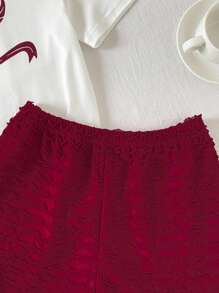 Set da due pezzi per ragazze pre-adolescenti, composto da top a maniche corte con stampa a fiocco in jacquard avorio e pantaloncini a righe in maglia, adatto per il ritorno a scuola - Multicolore - Visualizzare 12