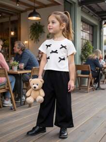 2pcs Girls Casual Comfortable Black Bow Decor Round Neck Short Sleeve T-Shirt & Milk Silk Flared Pants Set - Black and White - View 1