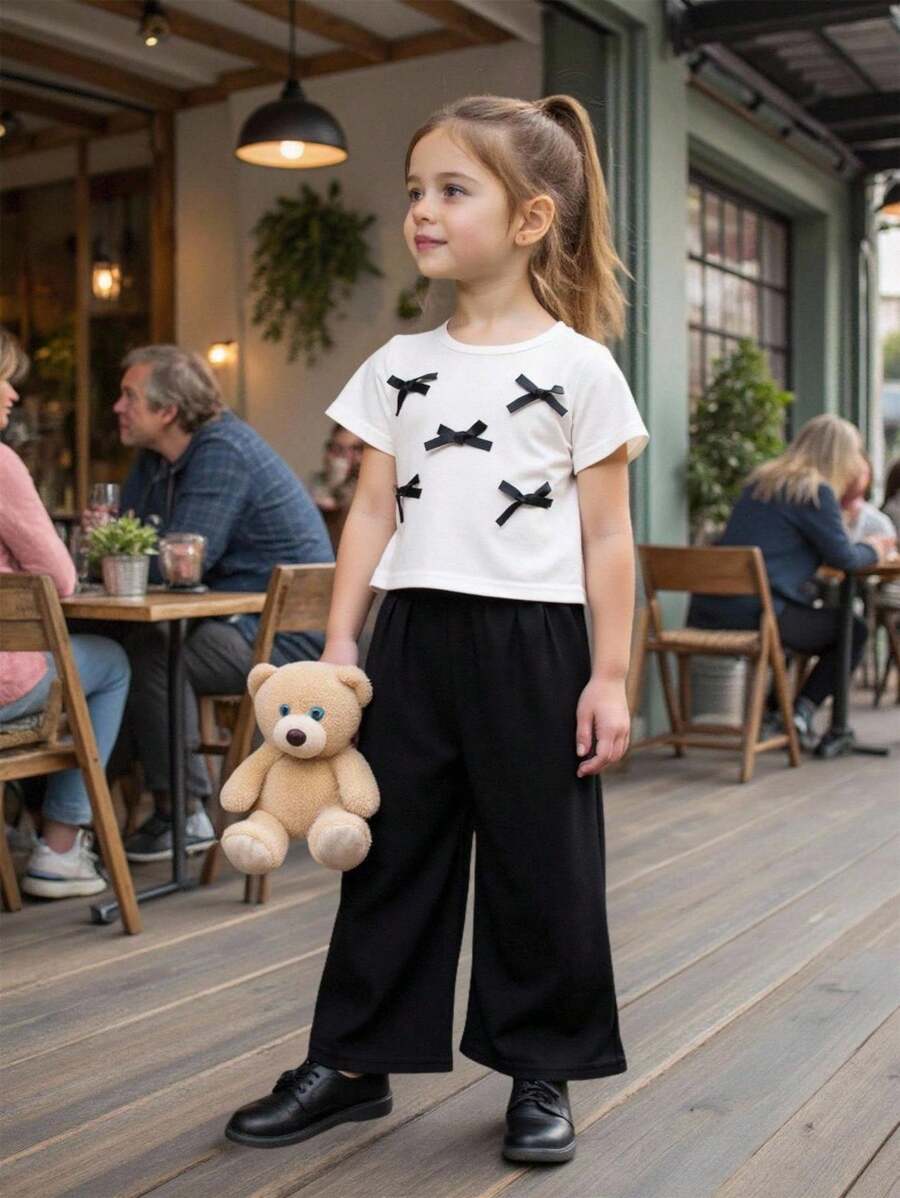 2pcs Girls Casual Comfortable Black Bow Decor Round Neck Short Sleeve T-Shirt & Milk Silk Flared Pants Set - Black and White - View 1
