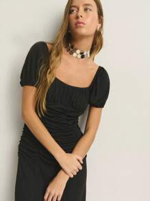 Nöista Romantic Bkack In This Ruched Black Midi Dress. With Puff Sleeves And A Flattering Gathered Bodice, It's Perfect For Sunset Dinners Or A Night Of Dancing. A Timeless Pick With Modern Flair.