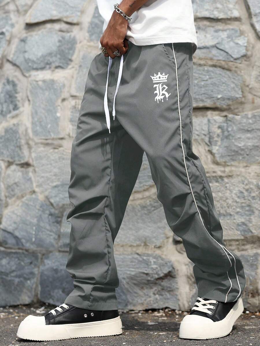 Manfinity EMRG 男士街头学院风裤子 美式复古速干伞兵工装裤 男士夏季Cleanfit曲刀阔腿裤 宽松直筒休闲裤男街头风裤子男运动裤 - 灰色 - 查看 1