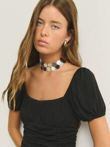 Nöista Romantic Bkack In This Ruched Black Midi Dress. With Puff Sleeves And A Flattering Gathered Bodice, It's Perfect For Sunset Dinners Or A Night Of Dancing. A Timeless Pick With Modern Flair.