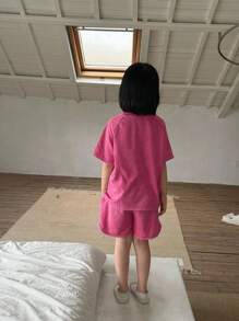 Conjunto deportivo de niña de estilo moderno en color rosa con bordado de letras, de tejido de punto suelto lavado, uso casual diario, minimalista y elegante