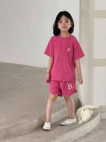 Conjunto deportivo de niña de estilo moderno en color rosa con bordado de letras, de tejido de punto suelto lavado, uso casual diario, minimalista y elegante