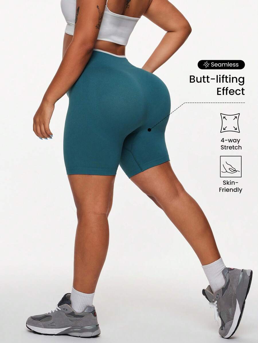 SHEIN Rhythm Era Shorts deportivos sin costuras y que realzan la figura para mujeres de talla grande - Verde Oliva - Ver 1