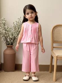 SHEIN Set de 2 piezas de ropa casual para niñas bebé - Top sin mangas con decoración de volantes y lazo, y pantalones largos de cintura elástica, cómodo para primavera/verano/otoño, adecuado para usar en casa y al aire libre - Rosa - Ver 3
