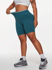 SHEIN Rhythm Era Shorts deportivos sin costuras y que realzan la figura para mujeres de talla grande - Verde Oliva - Ver 6