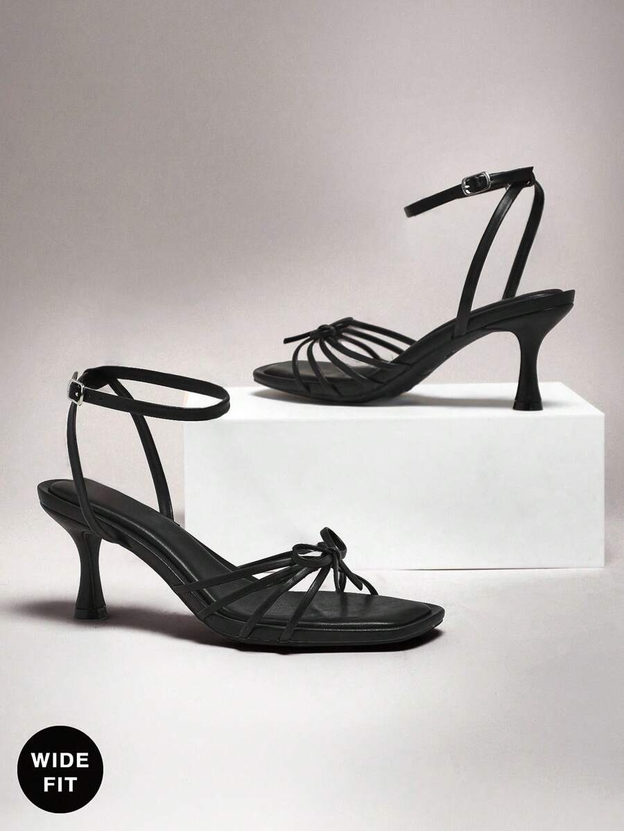 SHUZIA Sandalias de tacón de gatito cómodas y de estilo clásico con detalle de lazo, de ajuste amplio para mujer - Negro - Ver 1