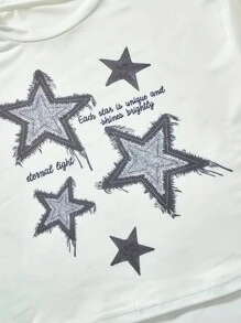 1 套青少年女孩休闲星星图案超大短袖轻质图形 T 恤搭配印花百褶裙，适合日常穿着和时尚外出，夏季