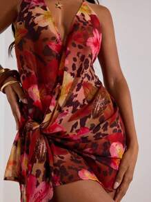 Opulessa 女士度假性感豹纹花卉印花露背迷你连衣裙